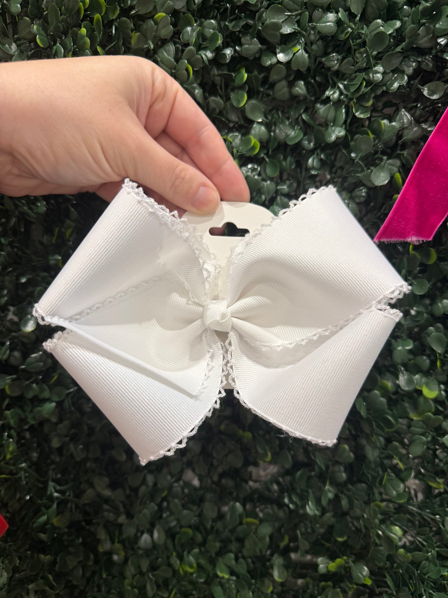 White bow with white stitch