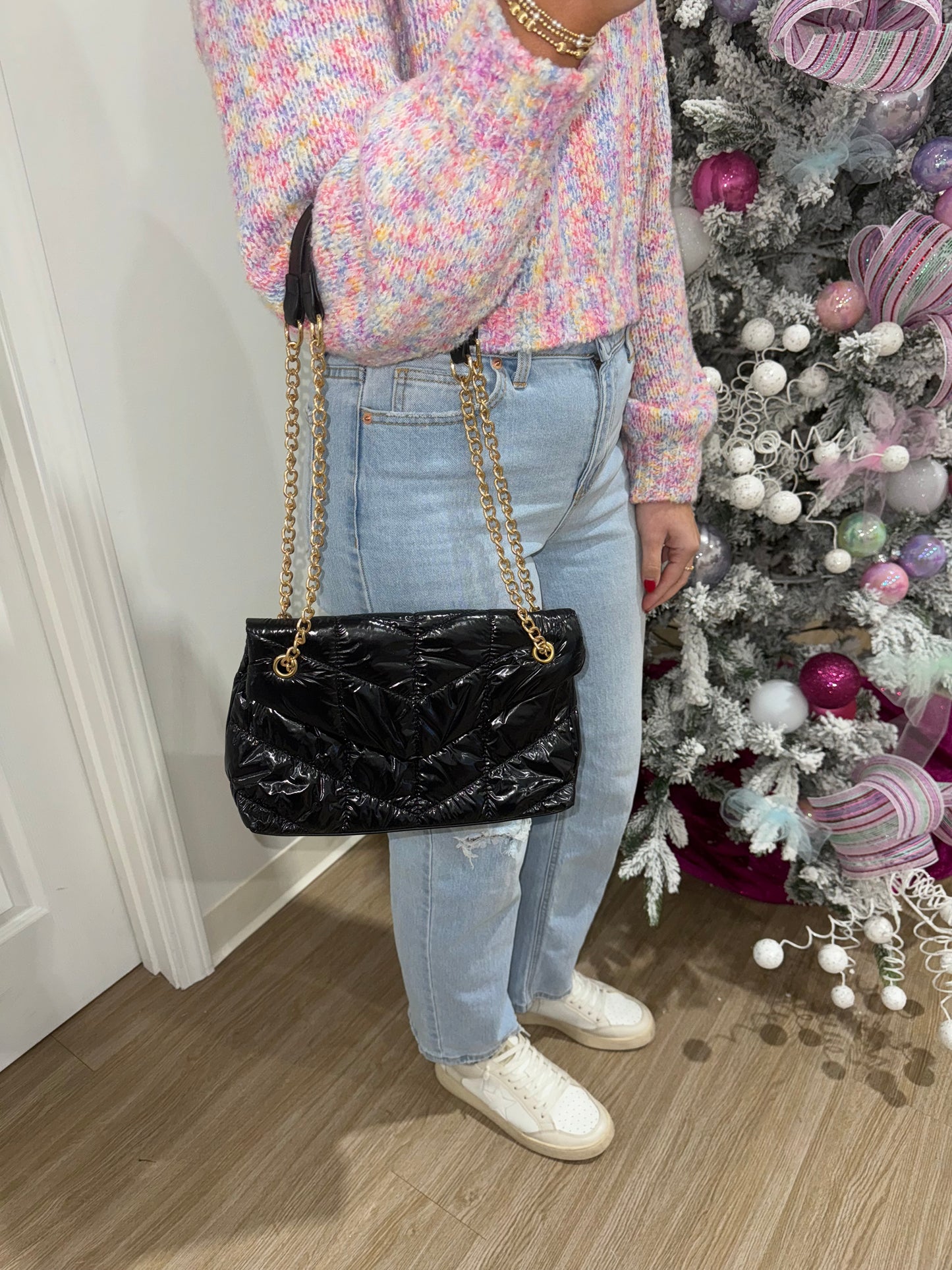 Black quilted purse with chain strap