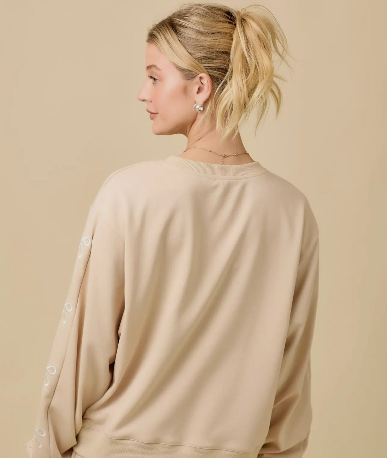 Taupe Bow Crewneck Sweatshirt Main Strip