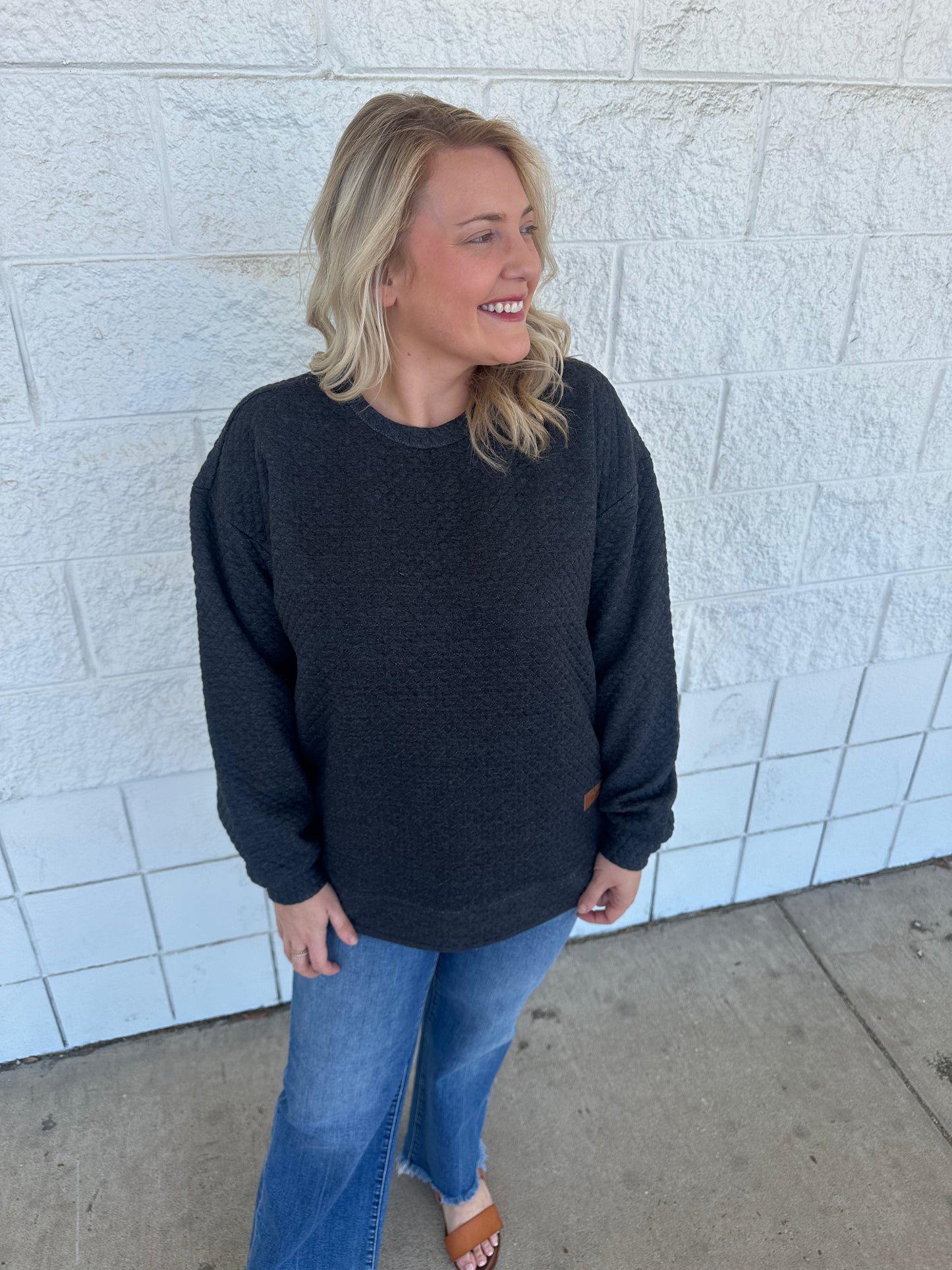 Black Quilted Rounded Bottom Fleece Crewneck