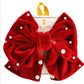 Red velvet bow with pearls