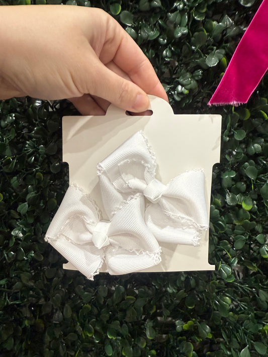 White bow with white stitch