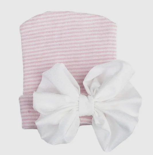 Pink and white newborn hat with bow