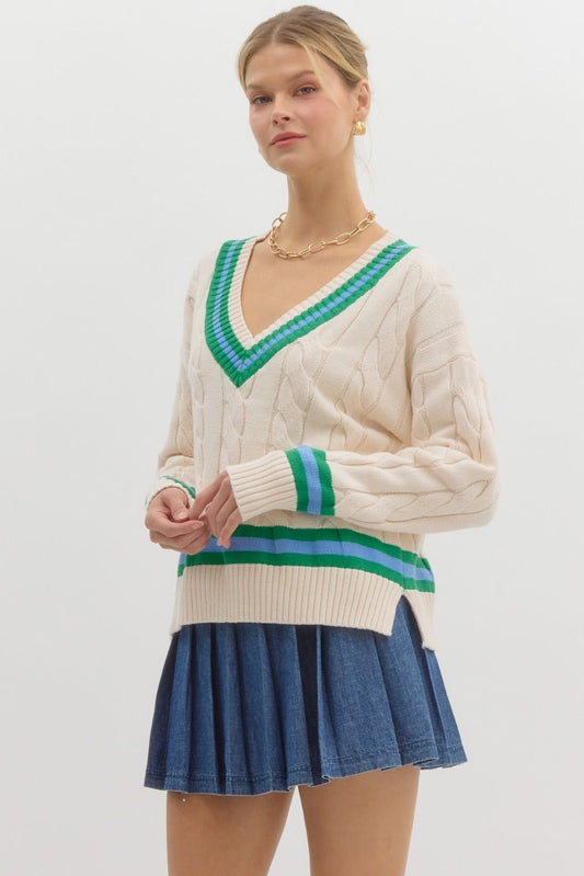 Blue and green cable knit sweater