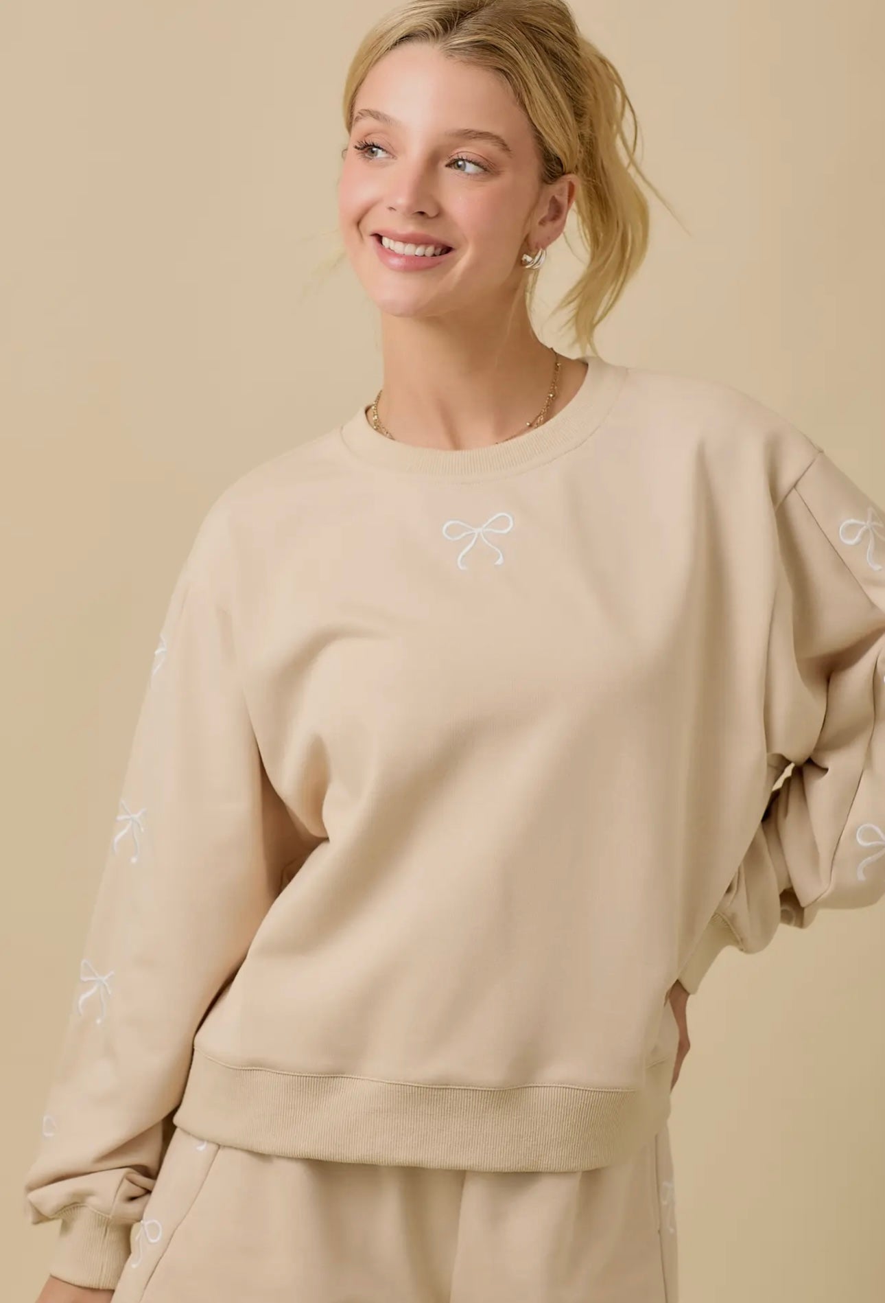 Taupe Bow Crewneck Sweatshirt Main Strip