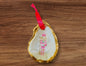 Oyster shell pink nutcracker ornament