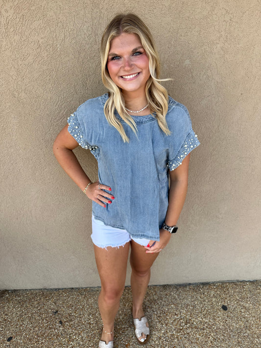 Denim top with pearl sleeve details